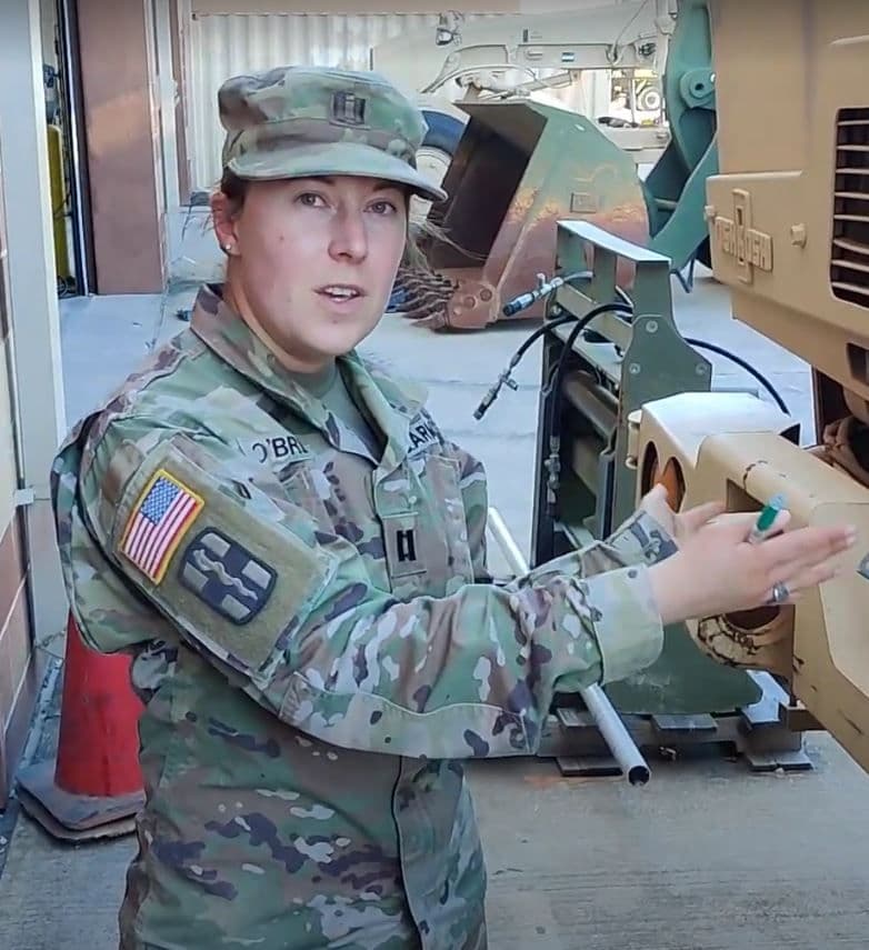 O'Brien inspecting military vehicles during her time in the Army.