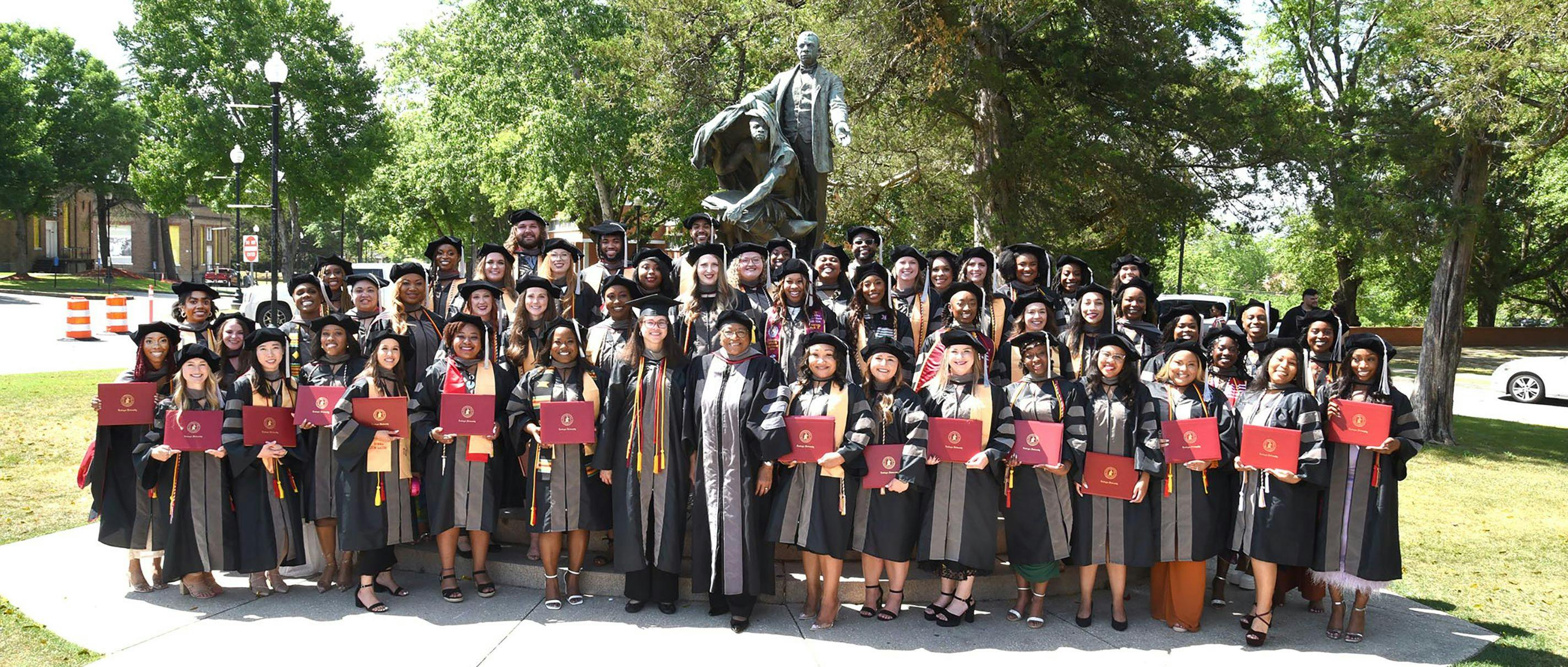 The Tuskegee University College of Veterinary Medicine's 2024 Class with Ruby L. Perry, DVM, MS, PhD, DACVR, dean of the College of Veterinary Medicine, and Ebony Gilbreath, DVM, PhD, DACVP, associate dean for Academic Affairs
