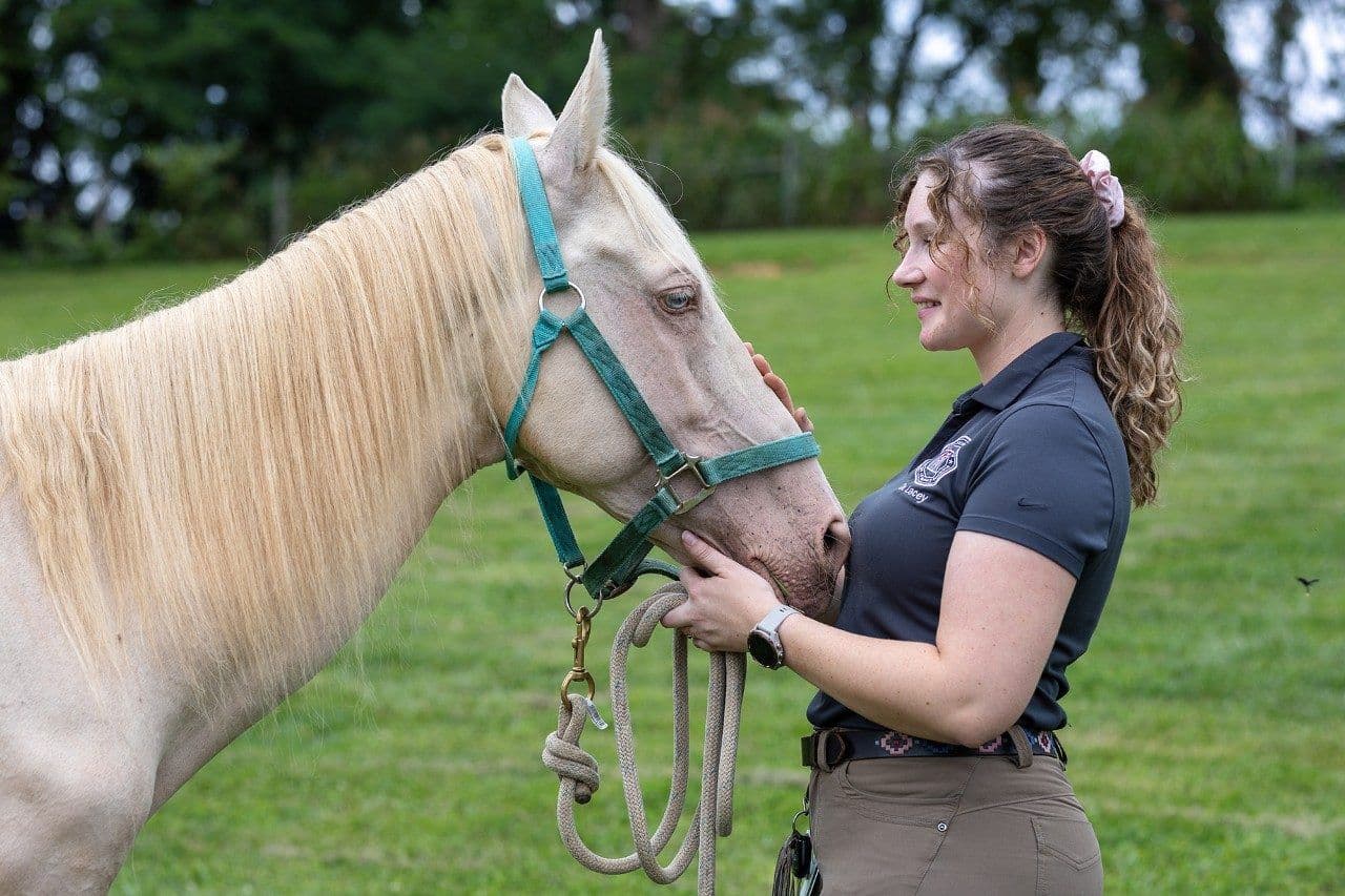 Emilee Lacey, VMD, with Kiergen (Image courtesy of Margie Christianson for Virginia Tech) 