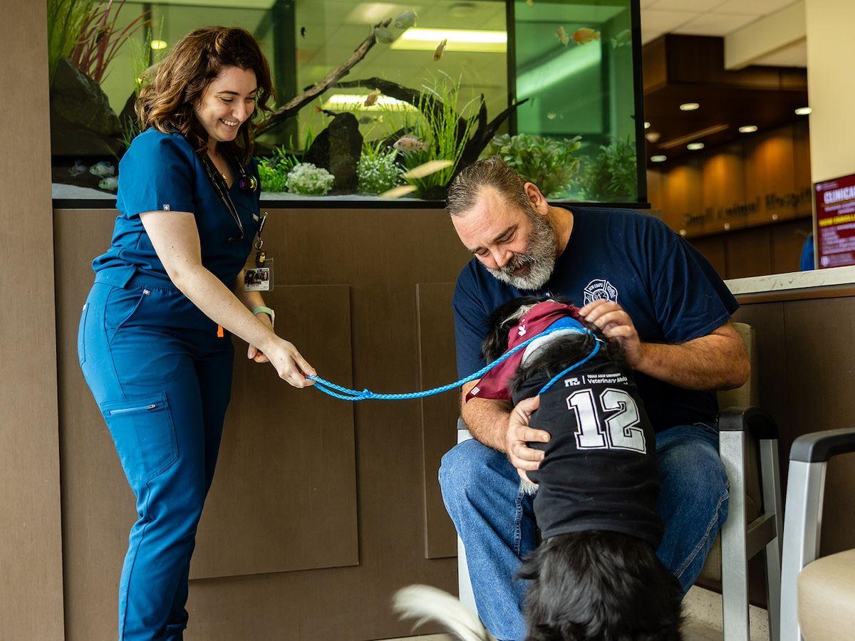 Samantha Eisner, DVM, Robert "Bobby" Harrod, and Sissy in the Texas A&M SATH.

Photo: Jason Nitsch, Texas A&M College of Veterinary Medicine and Biomedical Sciences