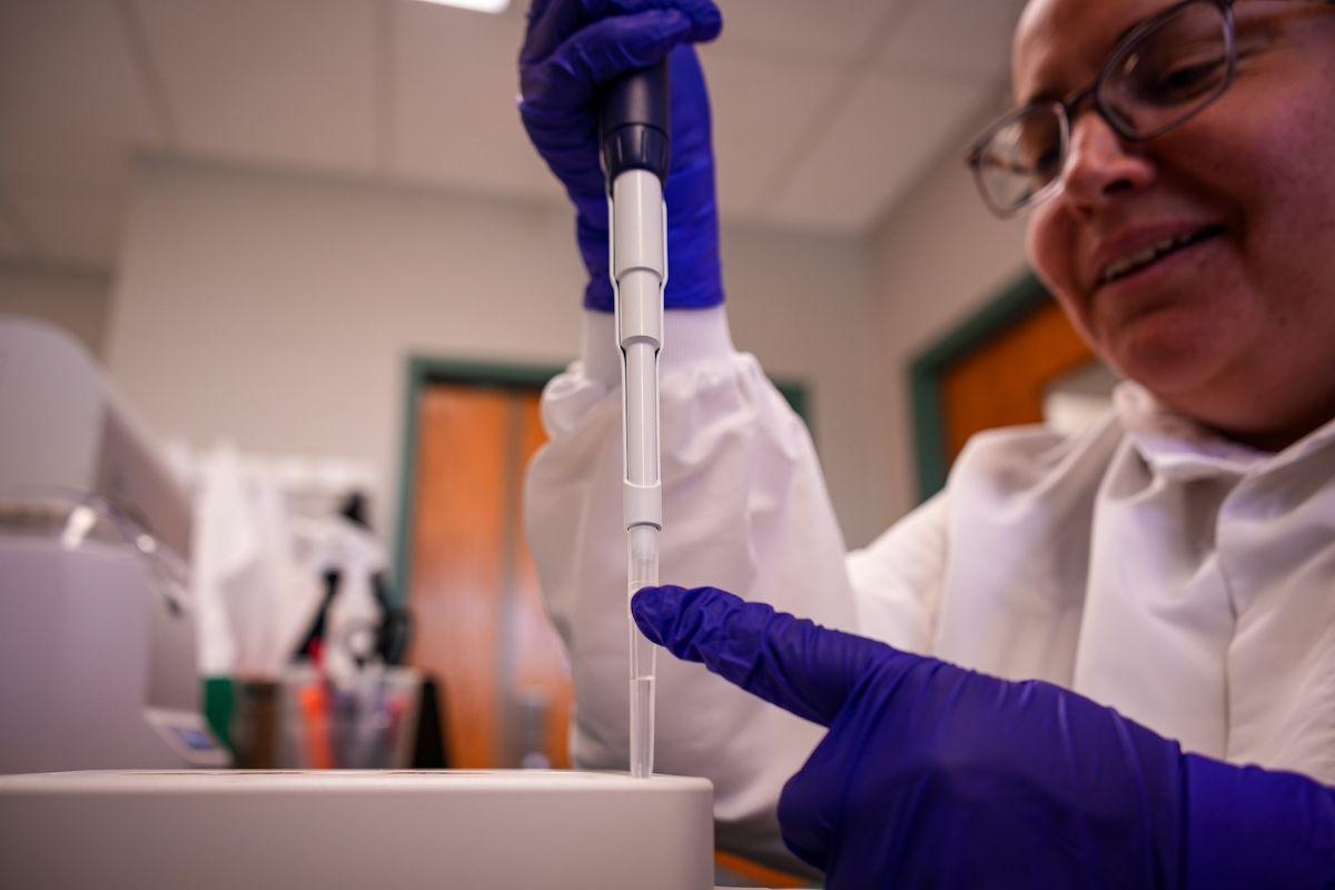 Ximena Olarte Castillo, PhD, postdoctoral associate at the Baker Institute for Animal Health, prepares a sample for NextSeq 1000 sequencer

Photo: John Enright/CVM Animal Health Centers